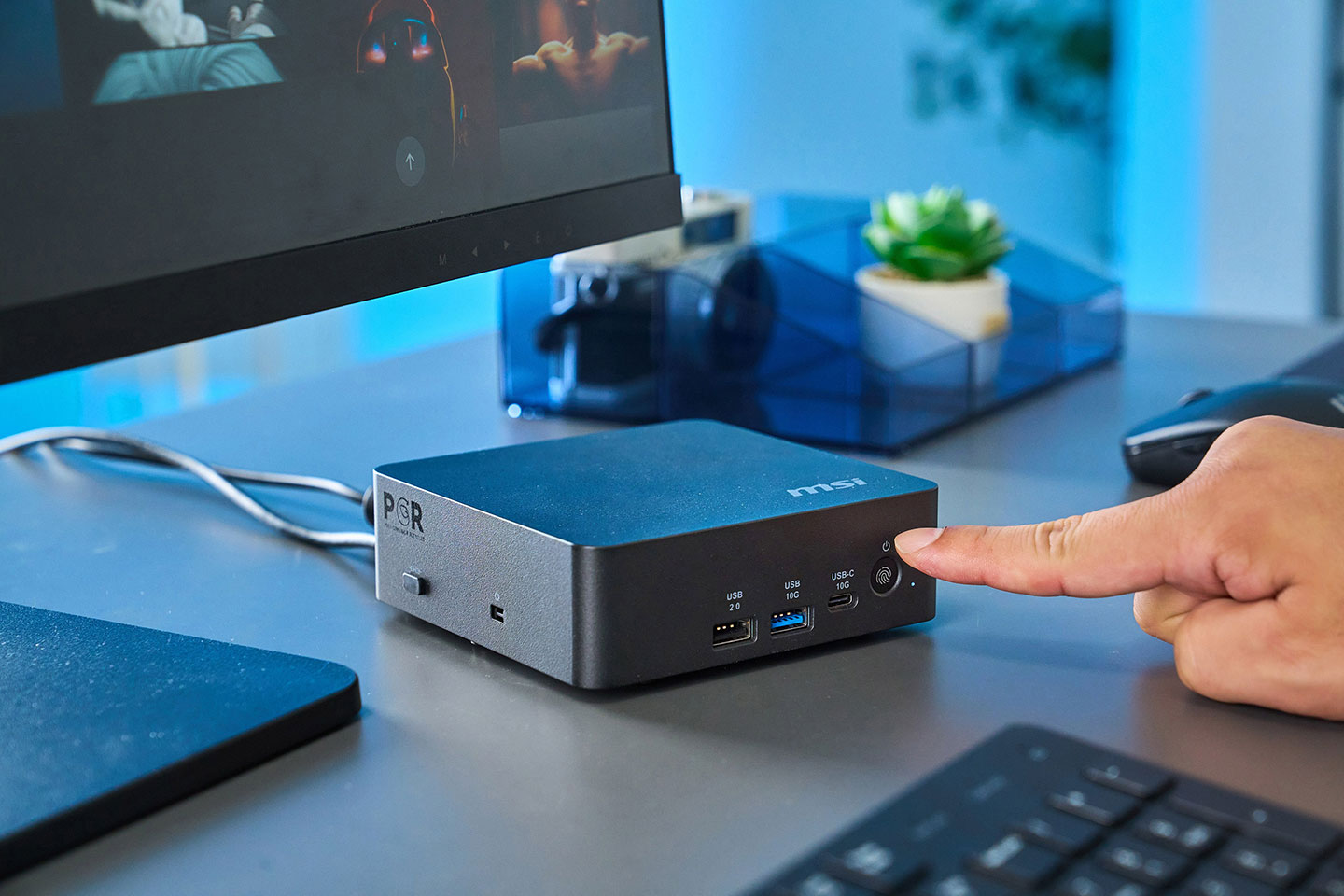 Cubi NUC AI+ 3MG 的電源鈕直接整合了指紋辨識器，在按壓開機的同時，也能完成系統登入的認證。